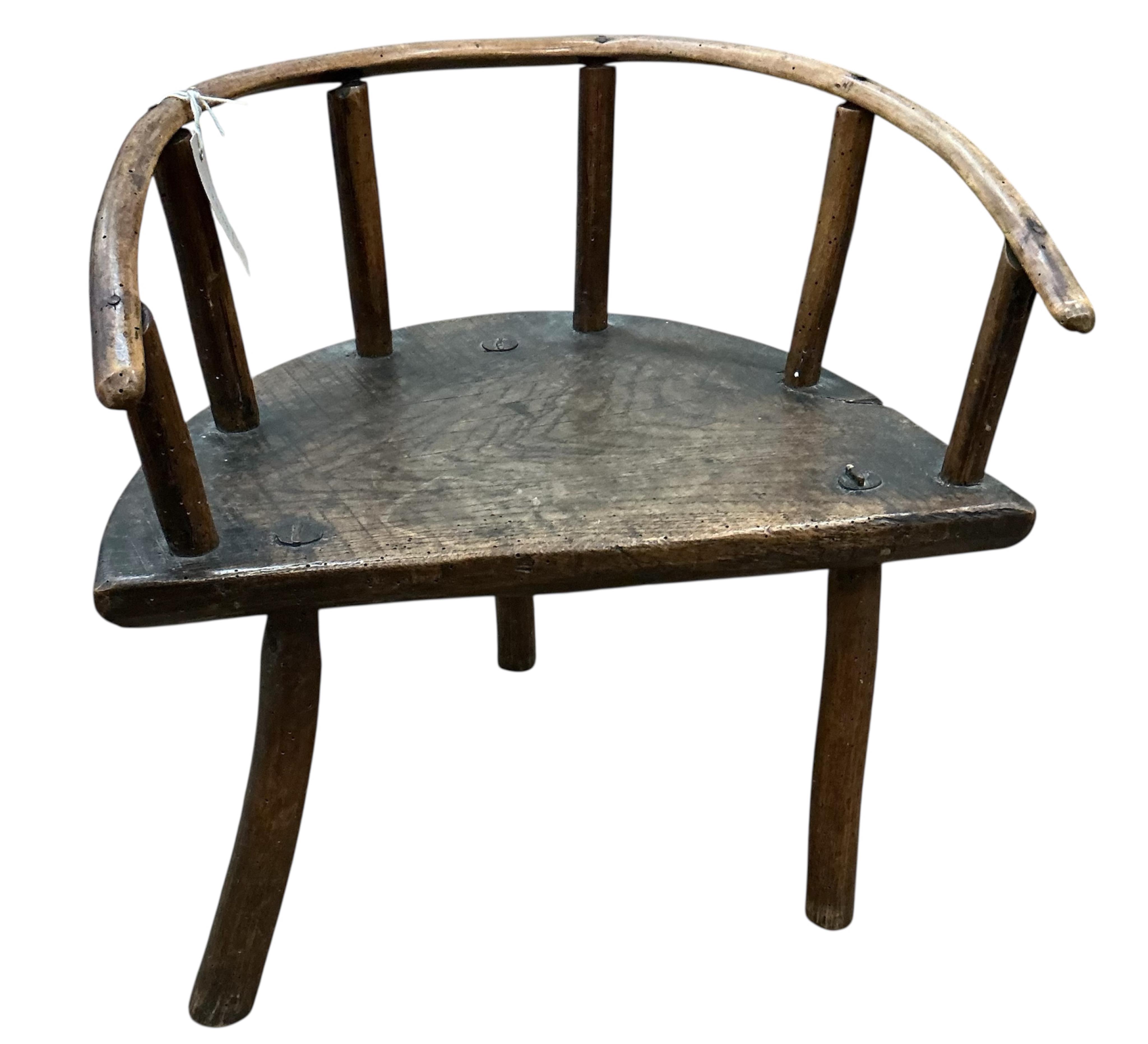 A 19th century elm and beech child's primitive chair, width 45cm, depth 32cm, height 45cm